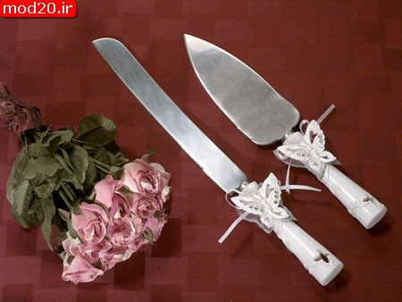 هفت مدل چاقو تزئین شده زیبا برای کیک عقد و عروسی  عکس چاقو تزئین شده با گل و روبان و تور و پروانه و طرح های جدید و شیک سال 93